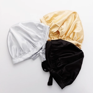 Three-pack adjustable satin hair caps in silver, gold, and black with high gloss finish