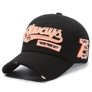 Vintage black washed baseball cap with orange 3D embroidery and distressed brim detail