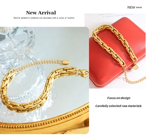 Macro detail of chunky gold chain bracelet with K18 tag on a red jewelry box