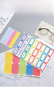 Detailed view of colorful rectangular adhesive labels showing handwriting compatibility