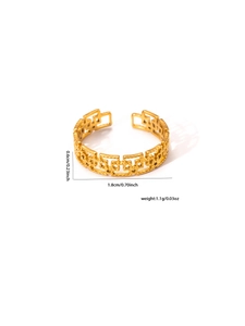 Detailed view of 18k gold plated steel ring with geometric pattern and dimensions