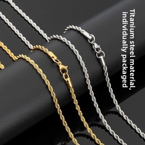 Detail of titanium steel rope chains in gold and silver finish with lobster clasps