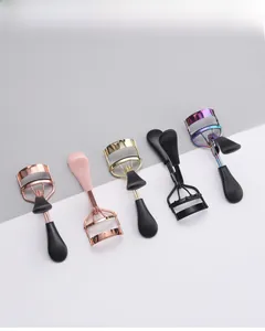 Multiple colors of stainless steel eyelash curlers including rose gold and purple