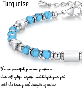 Macro shot of 4mm turquoise beads and polished stainless steel accents on the bracelet