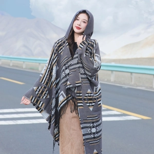 Bohemian hooded knit shawl with ethnic geometric patterns and decorative tassels