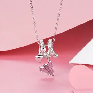 925 sterling silver paper plane and heart charm pendant with pink cubic zirconia