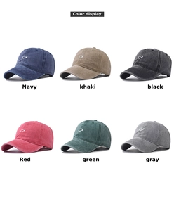 Washed cotton baseball cap color display with embroidered smiley face in six various colors