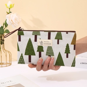 Canvas pencil case and cute cosmetic storage bag with forest tree print, portable and practical.