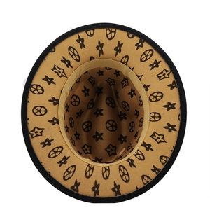 Detailed view of wide-brim wool fedora hat lining with geometric star pattern and sweatband