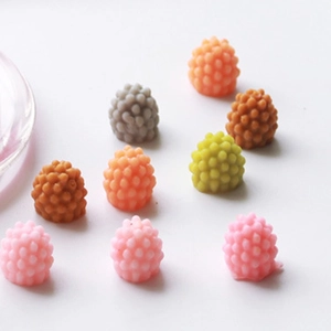 Multi-colored raspberry and mulberry shape silicone molds for DIY baking and resin crafts