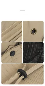 Detail of khaki outdoor bucket hat showing mesh lining, metal eyelets and adjustable cord