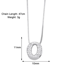 Macro shot of silver letter O pendant with cubic zirconia inlay and 47cm chain