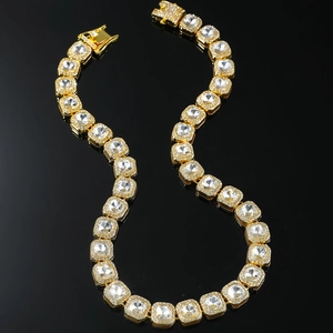 Hip hop style gold square link necklace with sparkling crystals on black background