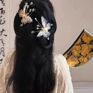 Translucent butterfly hair clip with tassels and pearls on hair for hanfu costume