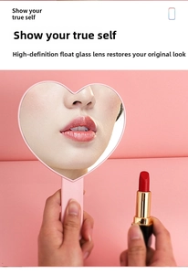 Detail of pink heart-shaped handheld makeup mirror with high-definition float glass lens