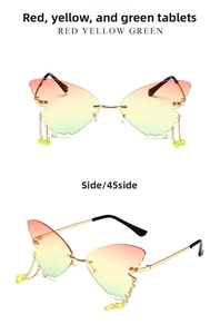 Detail of butterfly-shaped rimless sunglasses with gradient lenses and hanging bead charms