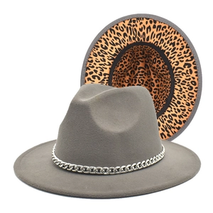 Gray wool fedora with silver chain and bold leopard print lining on the brim
