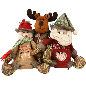Three Christmas gift bags featuring Santa, Snowman, and Reindeer with heart windows