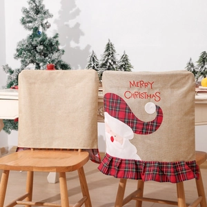 Detail of Christmas chair cover with Santa Claus embroidery and Merry Christmas text