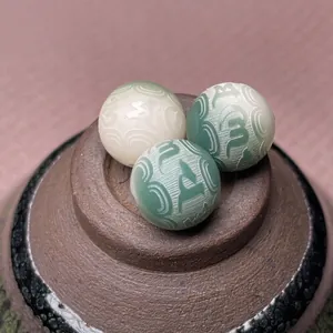 Polished White Bodhi beads with hand-carved Sanskrit symbols for DIY jewelry making