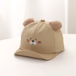 Detail of khaki baby sun hat with cute 3D ears and embroidered animal face design