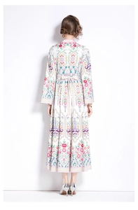 Back view of bohemian print maxi dress with colorful ethnic patterns and waist tie belt