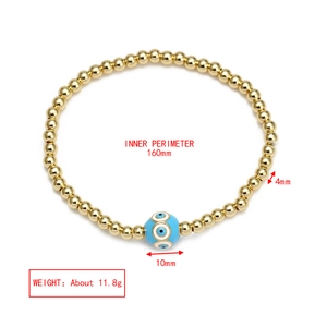 Detailed view of evil eye gold bead bracelet with 160mm length and 4mm beads