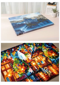 Macro shot of 5D diamond painting showing textured crystal beads and landscape pattern