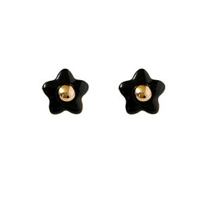 Elegant black minimalist five-petal flower stud earrings with a gold center accent
