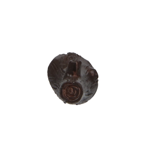 Detailed view of resin tree stump ornament with realistic wood grain texture and rings