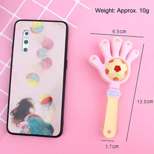 Creative macaron colored baby rattle hand clapper toy with rotating soccer ball part