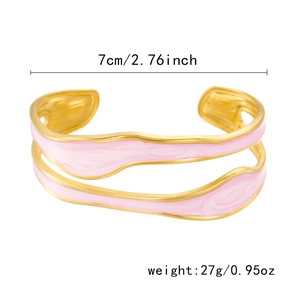 Detailed view of pink enamel wave bangle with 7cm diameter and 27g weight specification
