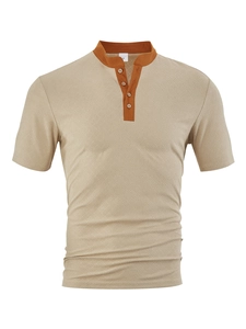 Detail of khaki textured knit fabric and contrast collar on casual short sleeve Henley shirt