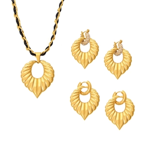 18K gold plated jewelry set with leaf pendants and rhinestone earrings on white background