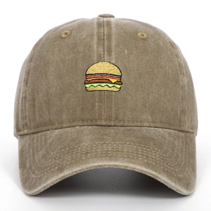 Close-up of burger embroidery on washed cotton vintage distressed baseball cap