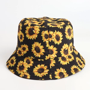 Detail of sunflower print pattern on black bucket hat with reinforced stitched brim
