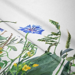 Detailed macro view of bohemian floral tapestry fabric with blue and yellow flower prints