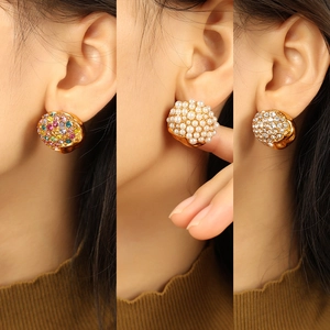 Luxury heart-shaped gold stud earrings featuring colorful crystals and elegant white pearls