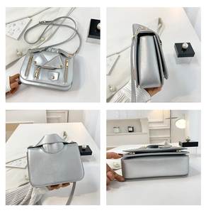 Detail view of silver PU crossbody bag featuring a creative motorcycle jacket design