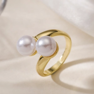 Elegant 18K gold plated double pearl bypass open ring for women on soft fabric