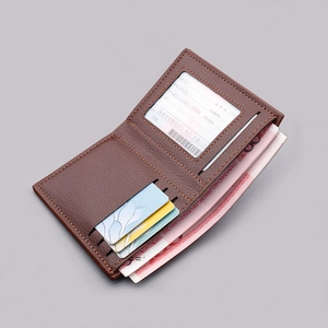 Vertical bifold brown leather wallet for men featuring multiple card slots and cash pocket