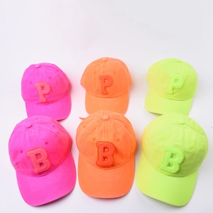 Neon fluorescent baseball caps with P and B towel embroidery in pink orange and green