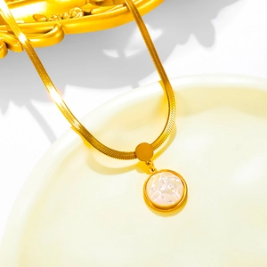 18K gold plated titanium steel snake chain necklace with a round mother of pearl pendant