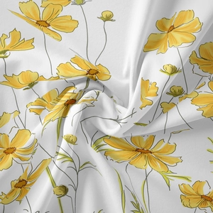 Macro shot of fabric texture showing soft yellow floral patterns on a bohemian tapestry