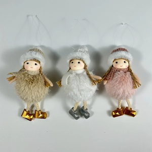 Detailed view of plush Christmas girl hanging ornaments in brown white and pink wool colors