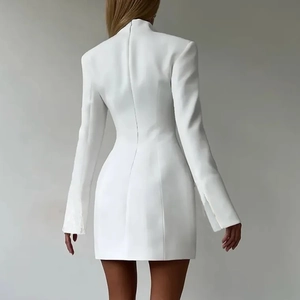 Back view detail of slim fit white mini dress featuring invisible zipper closure and seams