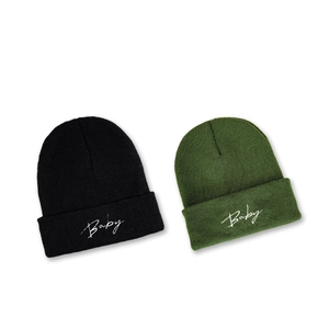 Minimalist knit beanie hats in black and olive green with white Baby script embroidery