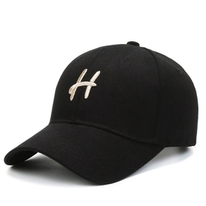 Classic black baseball cap with embroidered H logo on front from a 45-degree angle