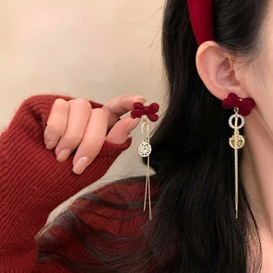 Festive red velvet bow earrings with gold Double Happiness pendants and tassels
