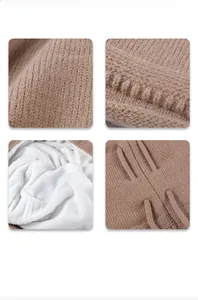 Detail of warm brown knit beanie showing ribbed texture and thick white fleece lining